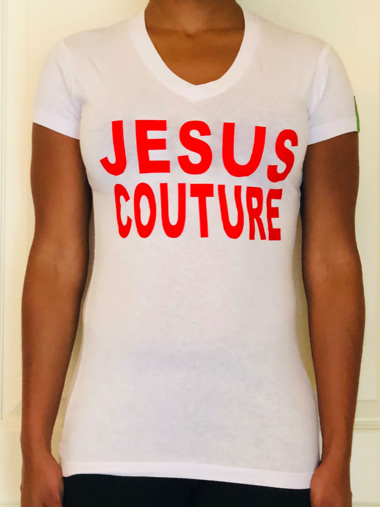 White t-shirt with the words JESUS COUTURE on the front in big red letters.