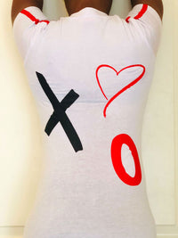 Back of white short-sleeved tee with red trim on shoulders. Has XO with heart.